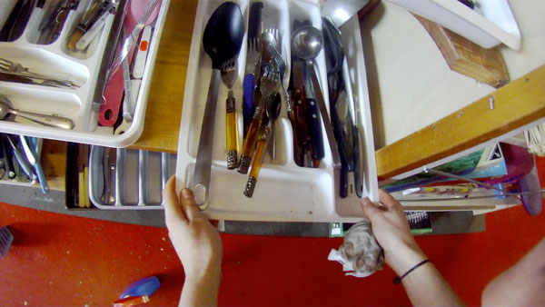 female hands cleaning cutlery