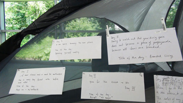 papers with messages attached to tent